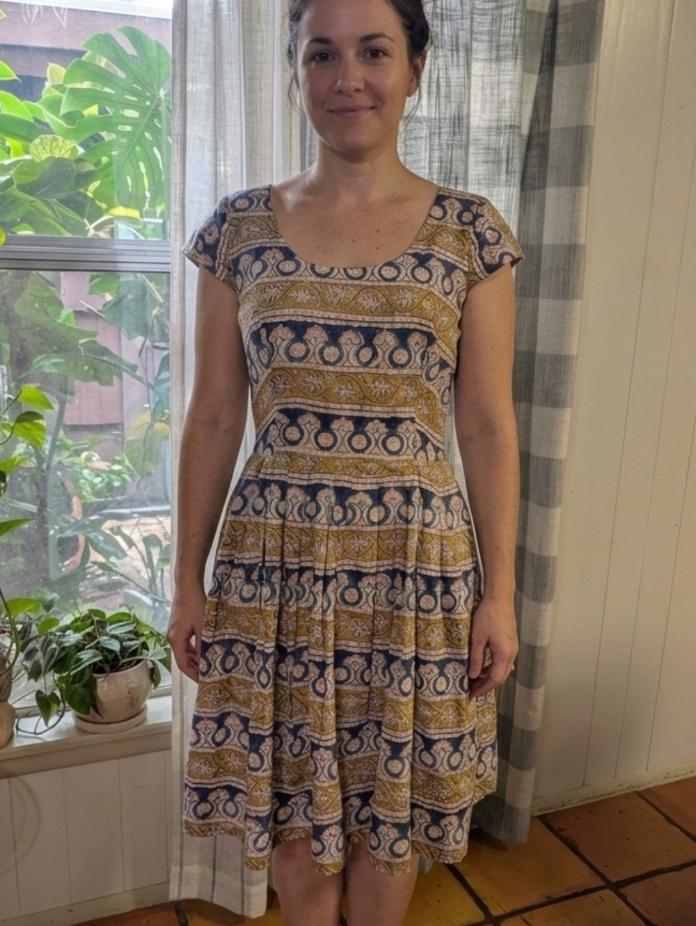 Corey Lynn Calter navy and mustard patterned cap sleeve dress